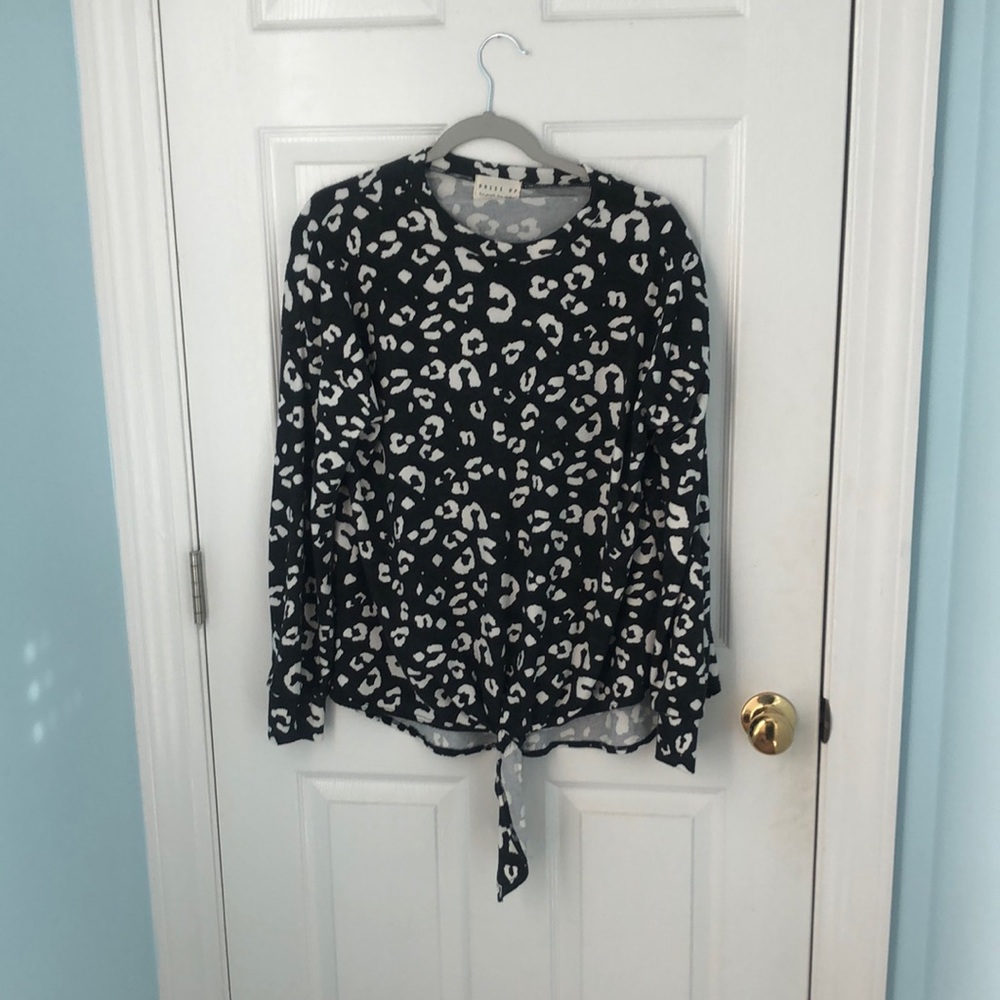 Black and white animal print tunic sweater